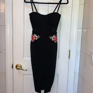 Black corset bodycon dress with embroidered roses.